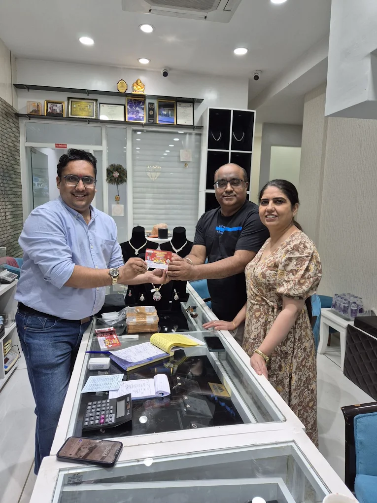 Customers and staff at the counter inside the Perfect Diamonds showroom in Chandigarh