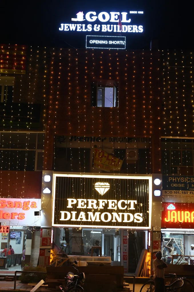 Perfect Diamonds showroom lit up at night in Chandigarh